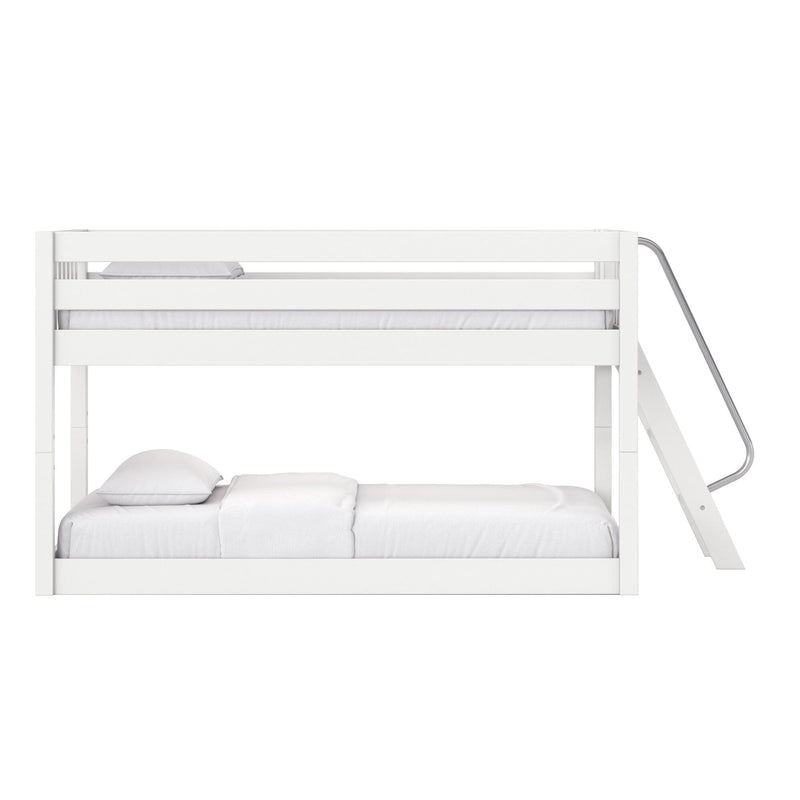 White wooden bunk bed with angled ladder and white bedding, modern minimalist frame with top and bottom bunks for kids' bedroom