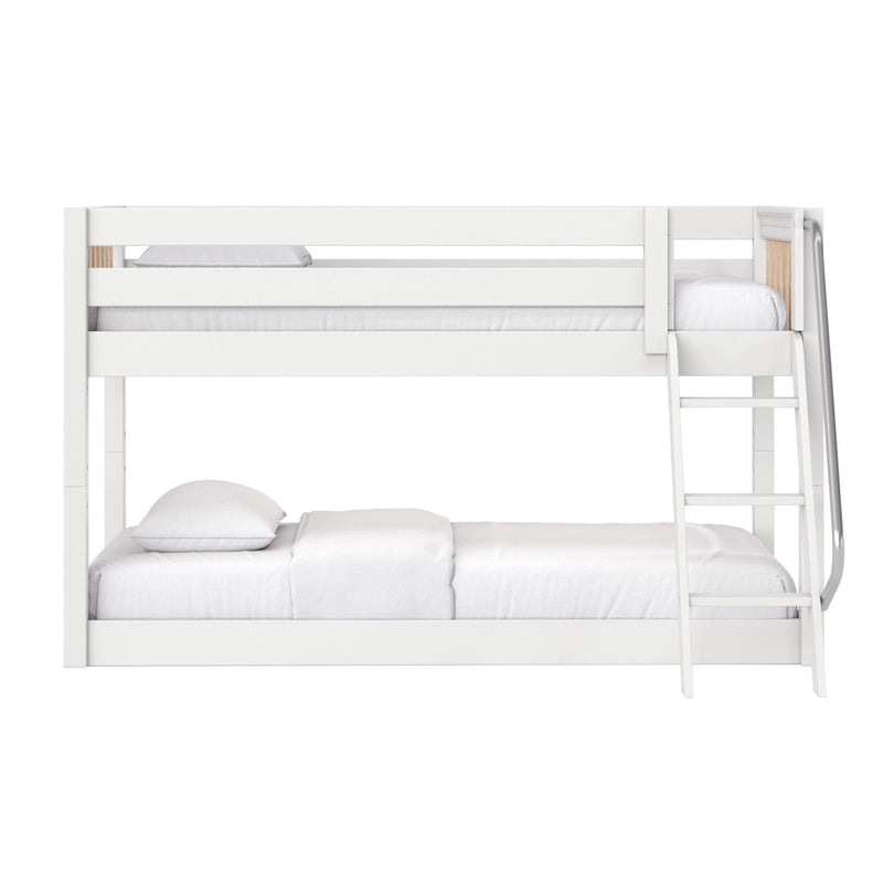 White wooden twin-over-full bunk bed with ladder and safety guardrails, modern space-saving kids or guest bedroom setup with white bedding