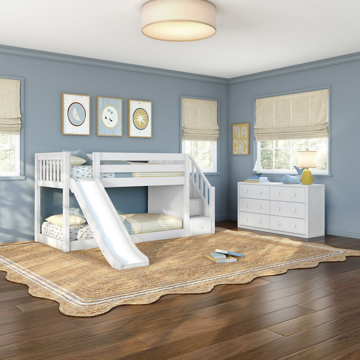 Modern kids' bedroom with white bunk bed and slide, blue walls, white dresser, jute rug, hardwood floors, nautical decor