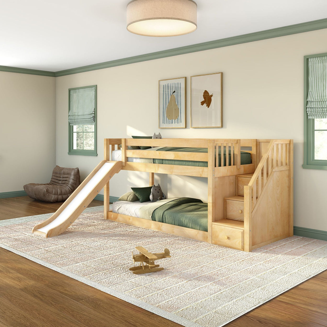 Children's room with natural wood twin-over-twin bunk bed with slide, built-in storage stairs, green bedding, plush toys and wooden airplane on beige rug