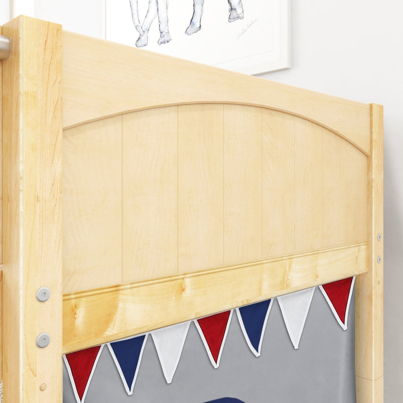 Close-up of light maple wood bed headboard with arched top and red white blue pennant bunting, kids bedroom decor