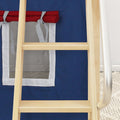 Natural wood bunk bed ladder and silver safety rail next to navy blue children's loft bed tent with white tie straps and red trim