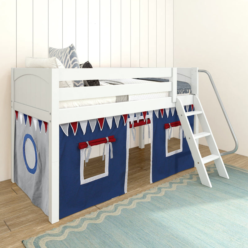 White loft bunk bed with ladder and navy-blue playhouse curtains featuring red-and-white pennant bunting, patterned pillows on mattress in kids' bedroom with wood floor and blue area rug
