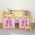 Natural wood loft bed with ladder and pink playhouse curtains underneath in a kids' bedroom, styled with decorative pillows and white shiplap wall