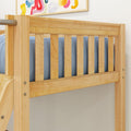 Close-up of natural pine wooden bunk bed rail and vertical slats with blue bedding and colorful abstract wall art, solid wood guardrail detail