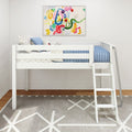 White loft bed with ladder in modern children's bedroom, blue quilted bedding and star-print pillows under colorful abstract wall art and gray geometric rug