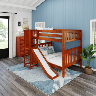 Kids' bedroom with wooden bunk bed featuring a slide, blue accent wall, and modern decor.