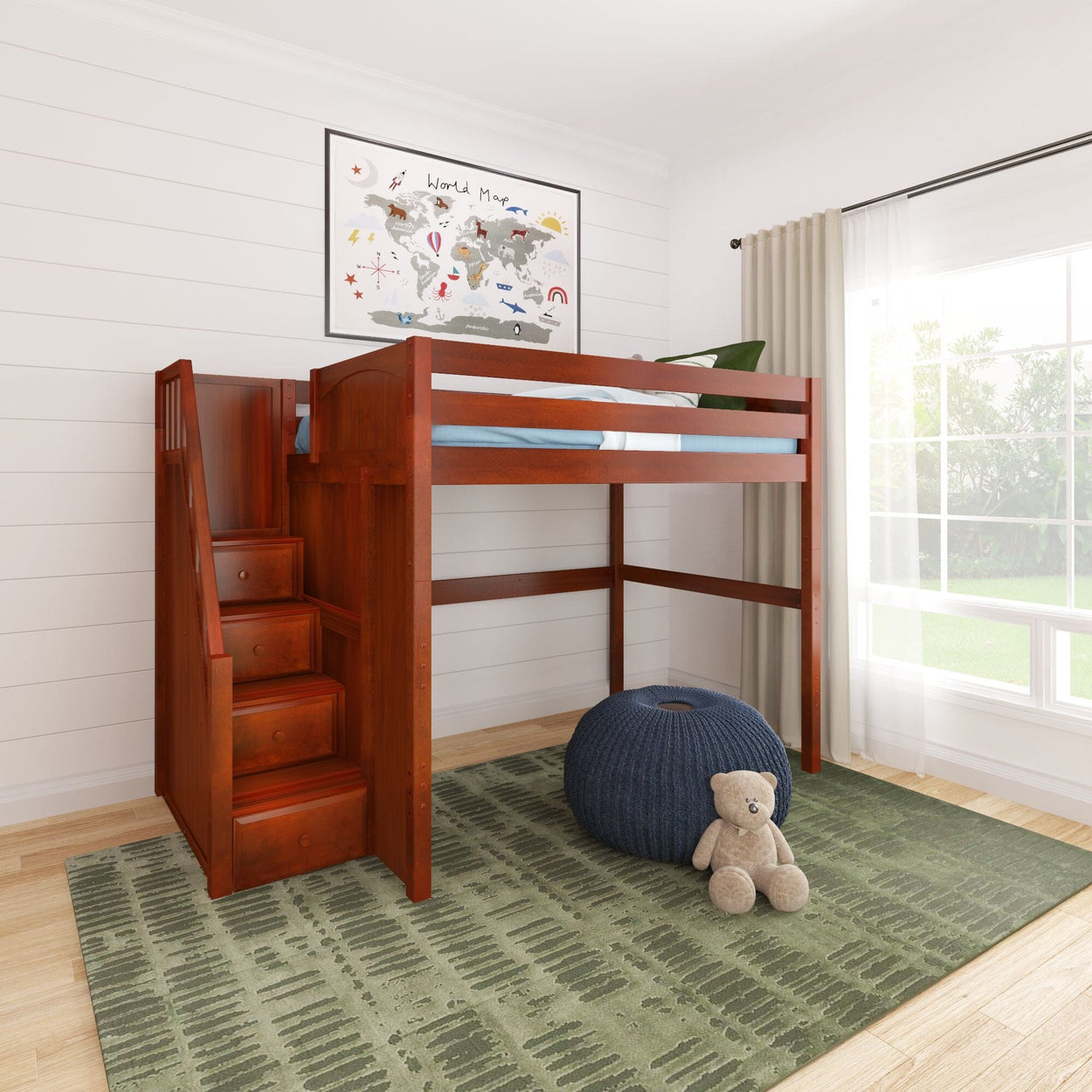 Kids loft bed with built-in stair storage, red wood frame in bright kids' bedroom with green rug, navy pouf, teddy bear and world map wall art