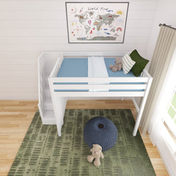 White wooden children's loft bed with staircase, blue bedding and green pillows, teddy bear, navy knit pouf, world map wall art and green patterned rug