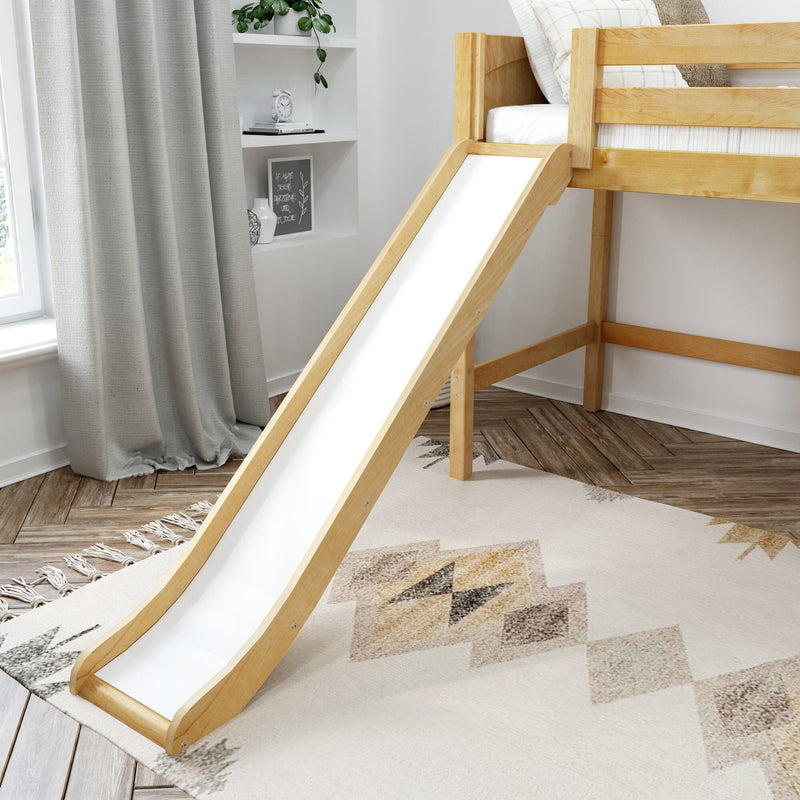 Wooden loft bed with slide in a modern neutral kids' bedroom, natural wood finish, gray curtains, boho rug, built-in shelves