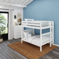 White wooden bunk bed in a modern coastal kids bedroom with blue shiplap accent wall, white dresser, soft pillows and bedding, natural light and wood plank flooring
