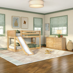 Natural wood bunk bed with slide in bright children's bedroom with green accents, wooden dresser, striped roman shades, area rug and wooden toy airplane