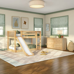 Bright kids bedroom featuring a natural wood bunk bed with slide, green-trim windows, matching dresser, wall art, area rug and hardwood floors