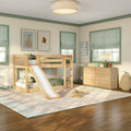 Children's bedroom with natural wood bunk bed and slide, green-trim windows with striped Roman shades, wooden dresser, plush toys and toy airplane on a neutral rug over hardwood floors, modern rustic kids' room decor