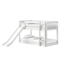 White wooden kids loft bunk bed with slide and ladder, top guardrail and lower sleeping area with pillows — modern children's bedroom furniture