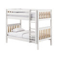 White wooden bunk bed with natural wood slat guardrails and ladder, white bedding — modern space-saving kids' bedroom furniture