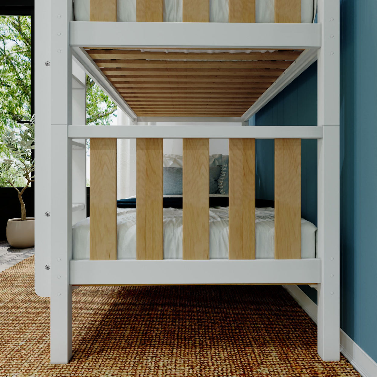 Stylish wooden bunk bed with white and natural wood finish in modern kid's bedroom.