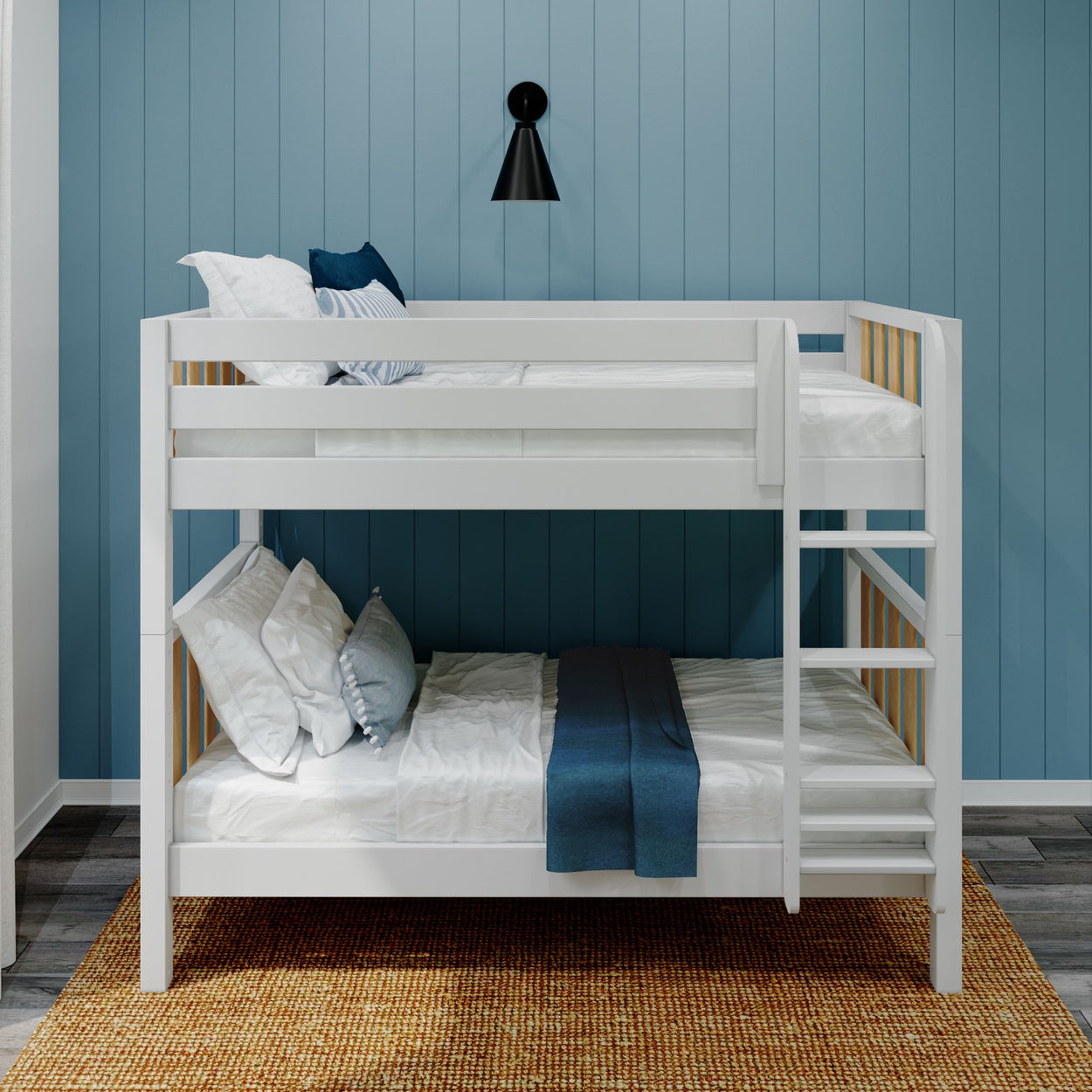 White bunk bed with blue wall background and modern decor.