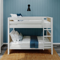 White bunk bed with blue wall background and modern decor.