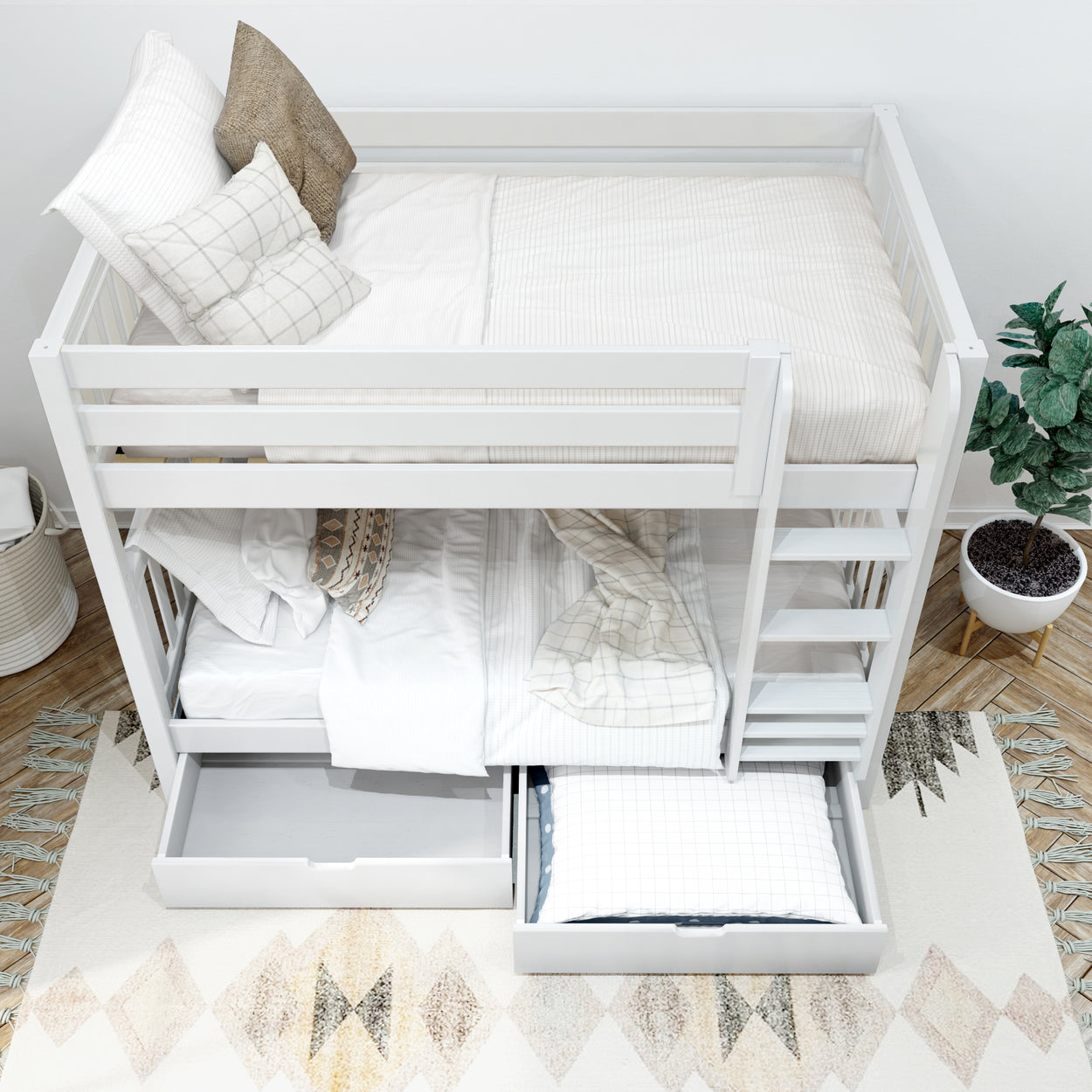 White bunk bed with storage drawers, cozy bedding, and decorative pillows in a modern bedroom setting.