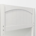 White arched vinyl garden gate close-up, showing vertical panels, curved top rail, horizontal support board and exposed metal bolts