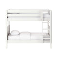 White wooden bunk bed with built-in ladder and guard rails, minimalist space-saving design with white bedding