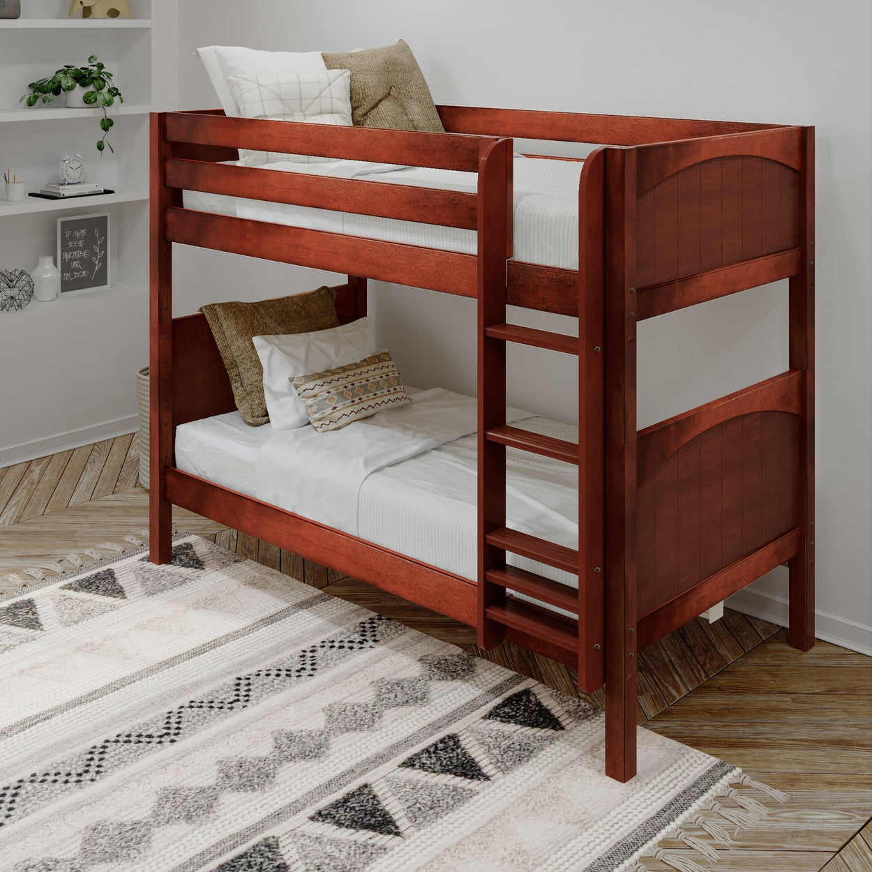 Elegant wooden bunk bed with ladder in a modern bedroom setting, featuring textured rugs and cozy pillows.