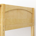 Close-up of a light maple wood headboard with an arched top, vertical slats, visible bolts and natural wood grain, detail of a wooden bed frame