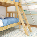 Natural wood bunk bed with ladder and blue quilted bedding in kids' bedroom