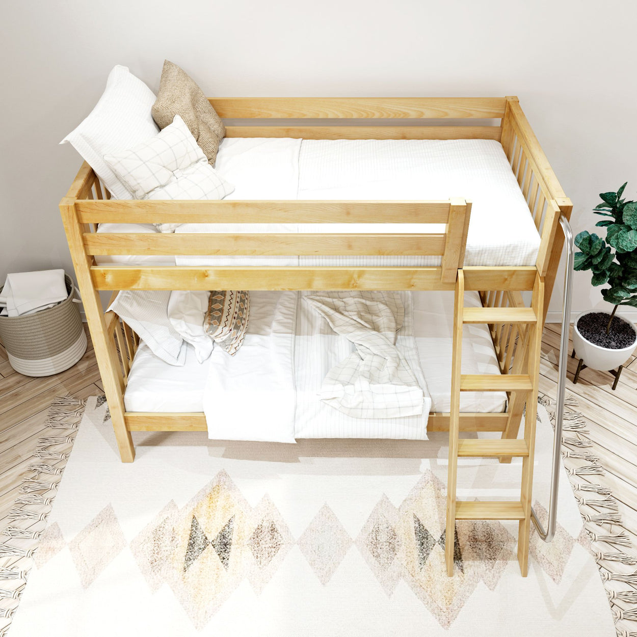 Wooden bunk bed with white bedding in a bright, cozy bedroom setting.