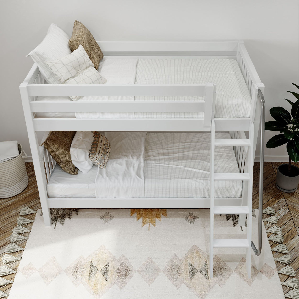Modern white bunk bed with cozy pillows, ladder, and stylish decor in a bright bedroom setting.