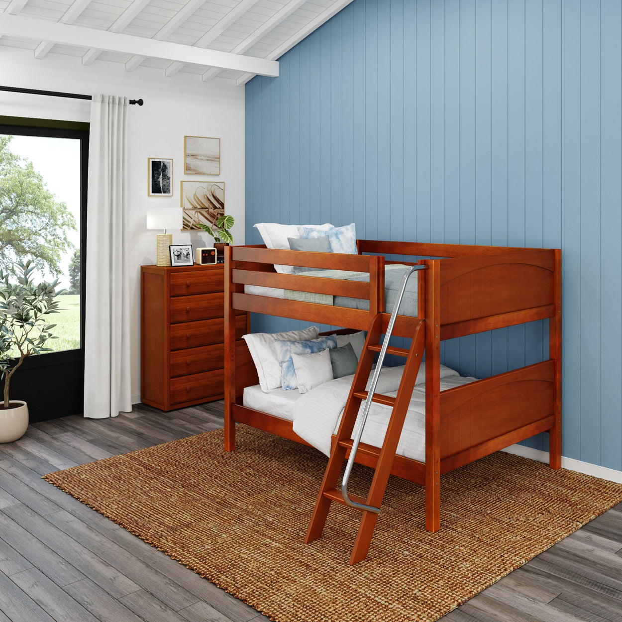 Wooden bunk bed with ladder in a modern blue-themed bedroom.