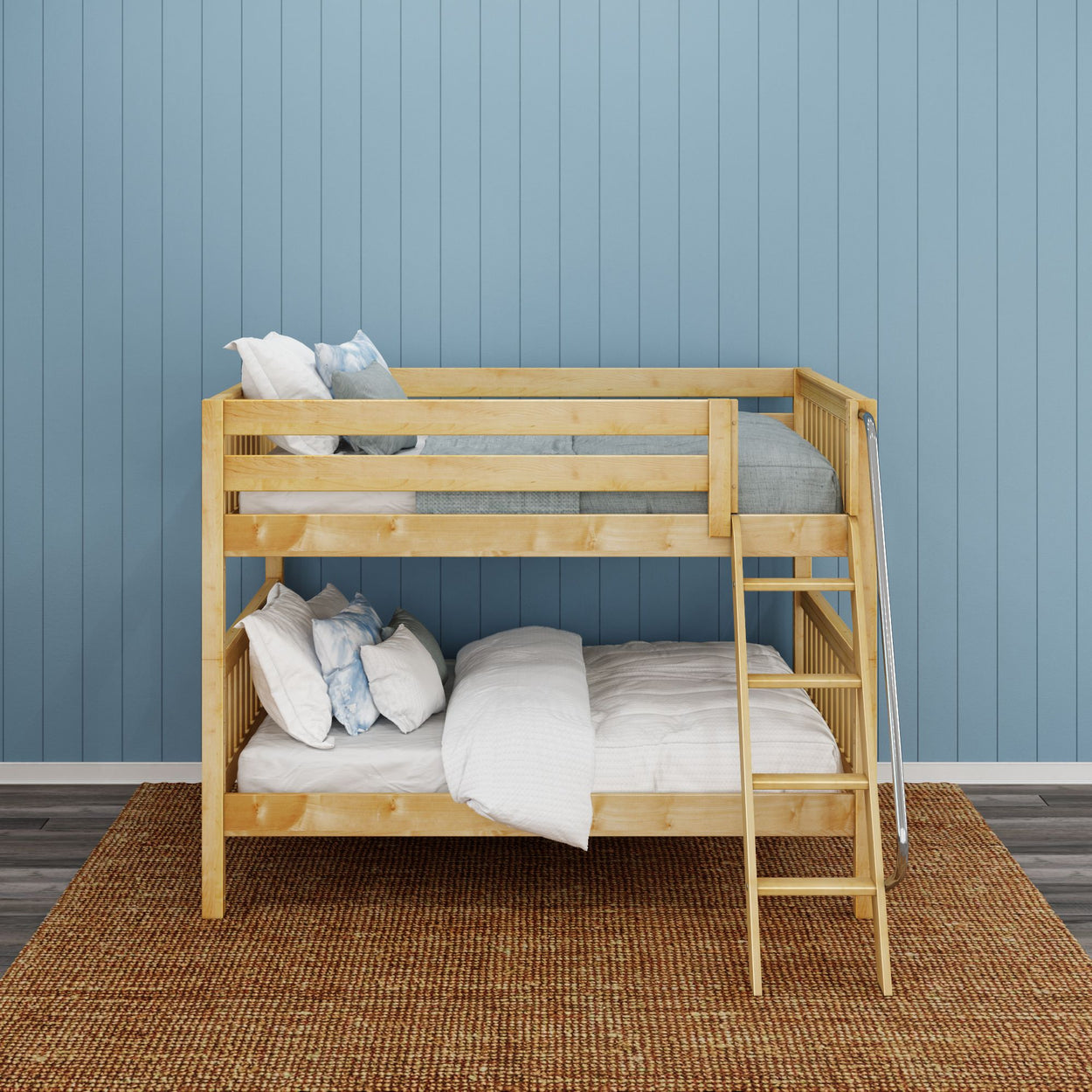 Wooden bunk bed with ladder against blue paneled wall in cozy bedroom setting.