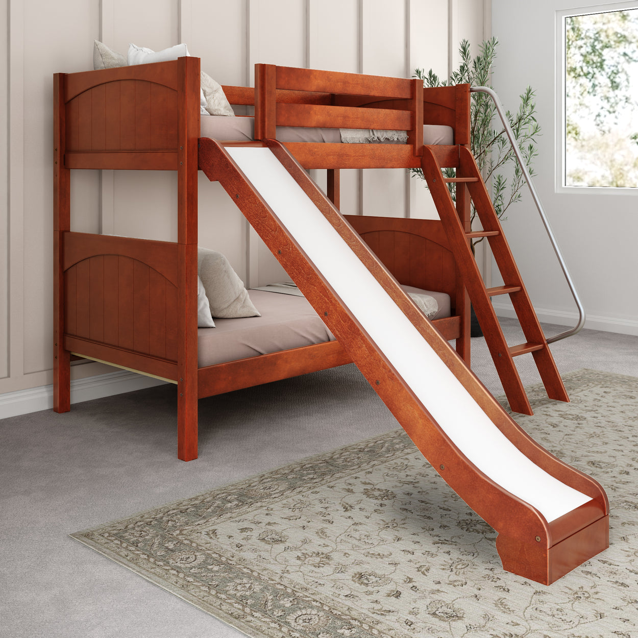 Wooden bunk bed with slide in children's room, featuring a comfortable design with ladder access and soft bedding.
