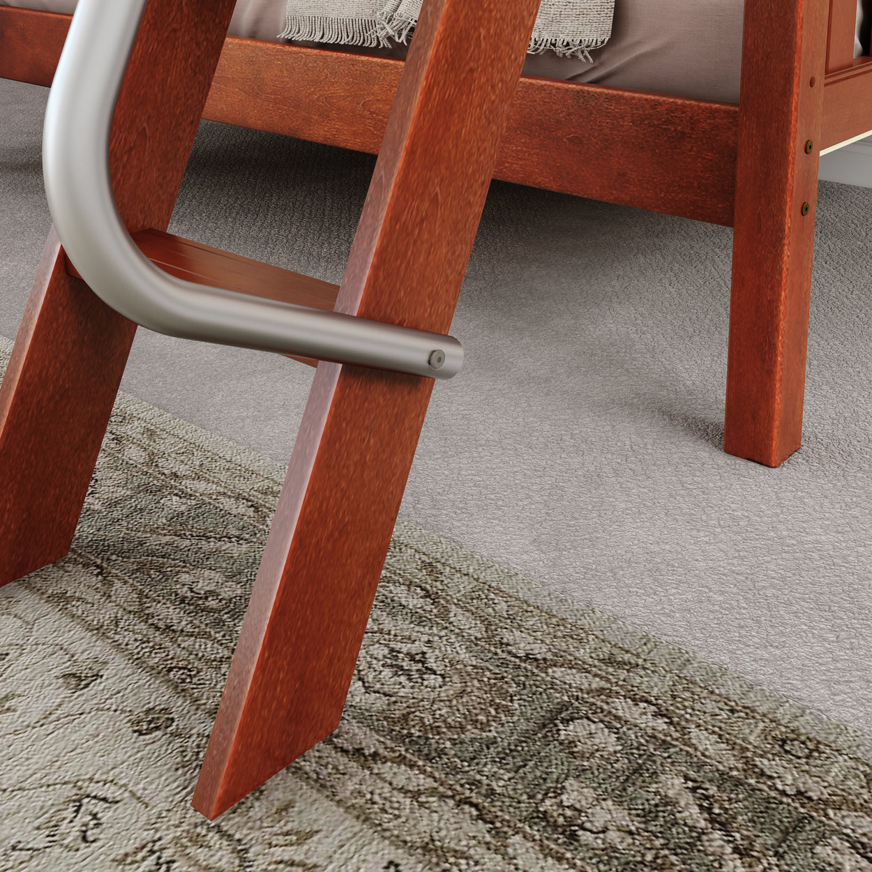 Wooden bunk bed ladder with metallic handrail on a carpeted floor with a decorative rug.