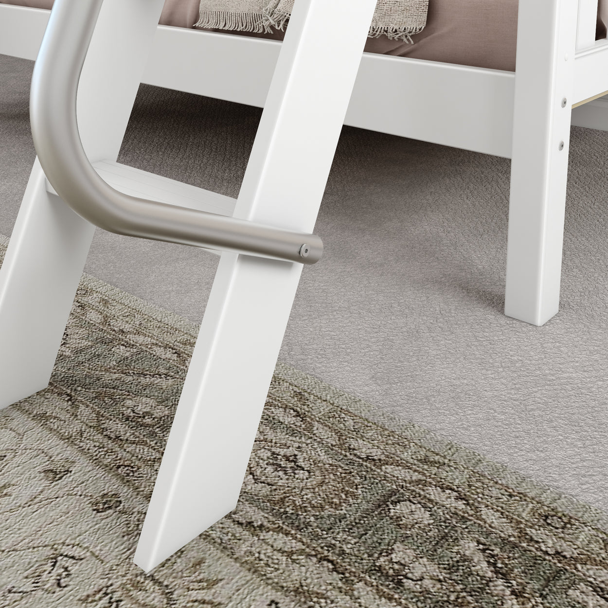 White bed ladder with safety handle on a patterned rug and carpet floor.