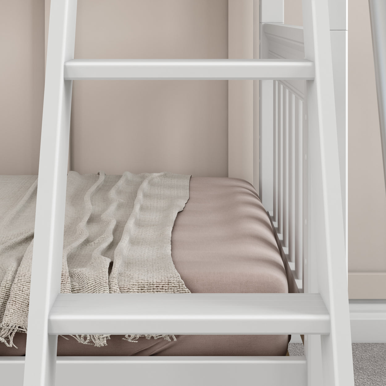 White bunk bed ladder next to beige bedding and a light woven blanket.