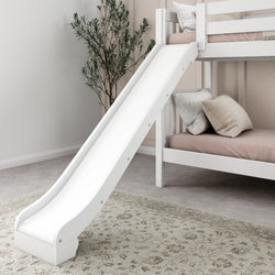 White bunk bed with slide in modern bedroom setting.