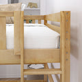 Light natural wood bunk bed for kids with safety guardrail, white mattress and bedding, woven accent pillow and under-bed storage basket in modern bedroom