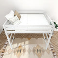 White loft bed in minimalist nursery with white bedding, textured decorative pillows, herringbone wood floor and patterned boho rug