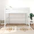 Modern white wooden loft bed with safety rails, neutral pillows, patterned rug and potted plant in bright minimalist kids' bedroom