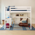 White loft bed with ladder and blue bedding over built-in desk and study area in a kids' bedroom with backpack, football and cozy reading nook