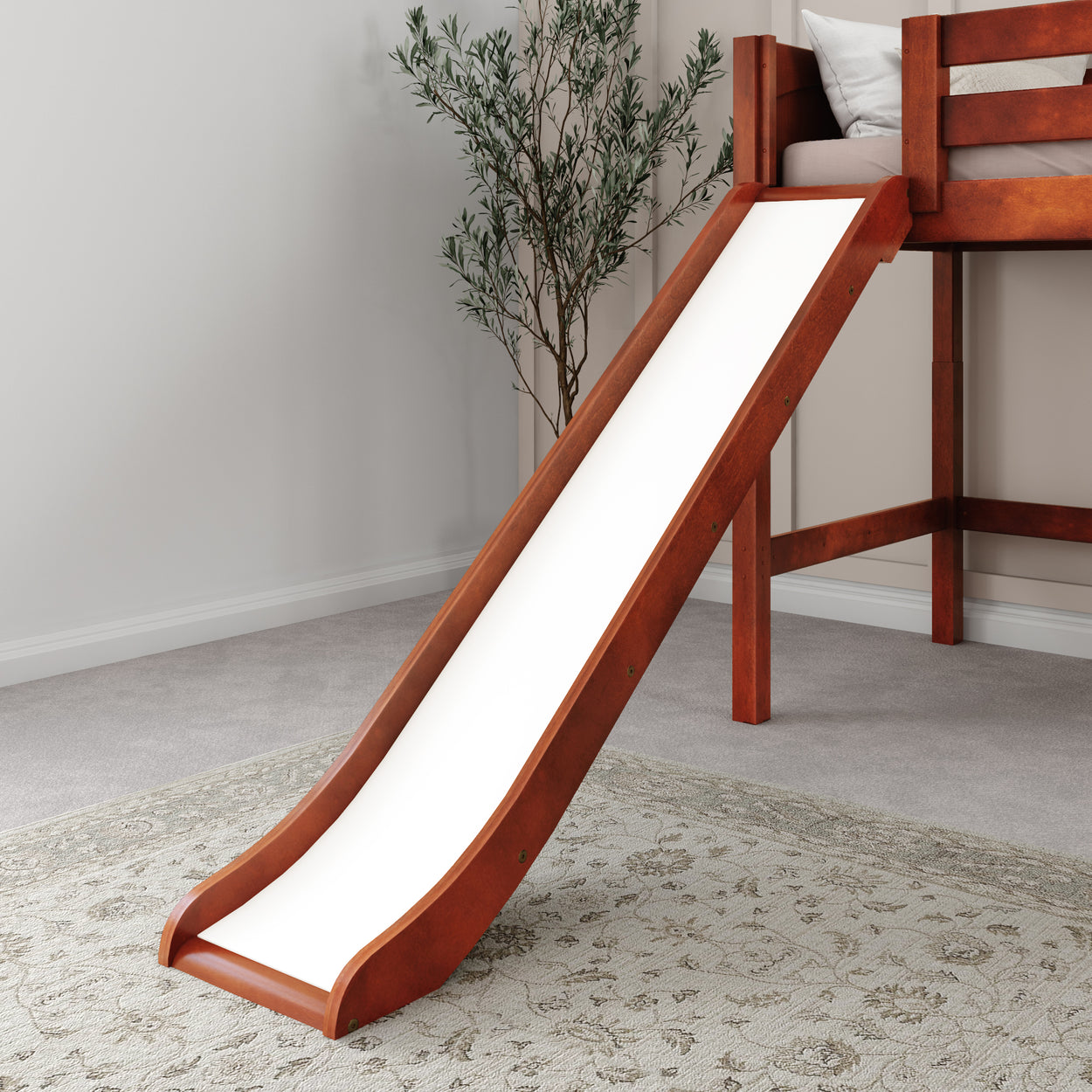 Wooden loft bed with attached slide in a modern children's room.