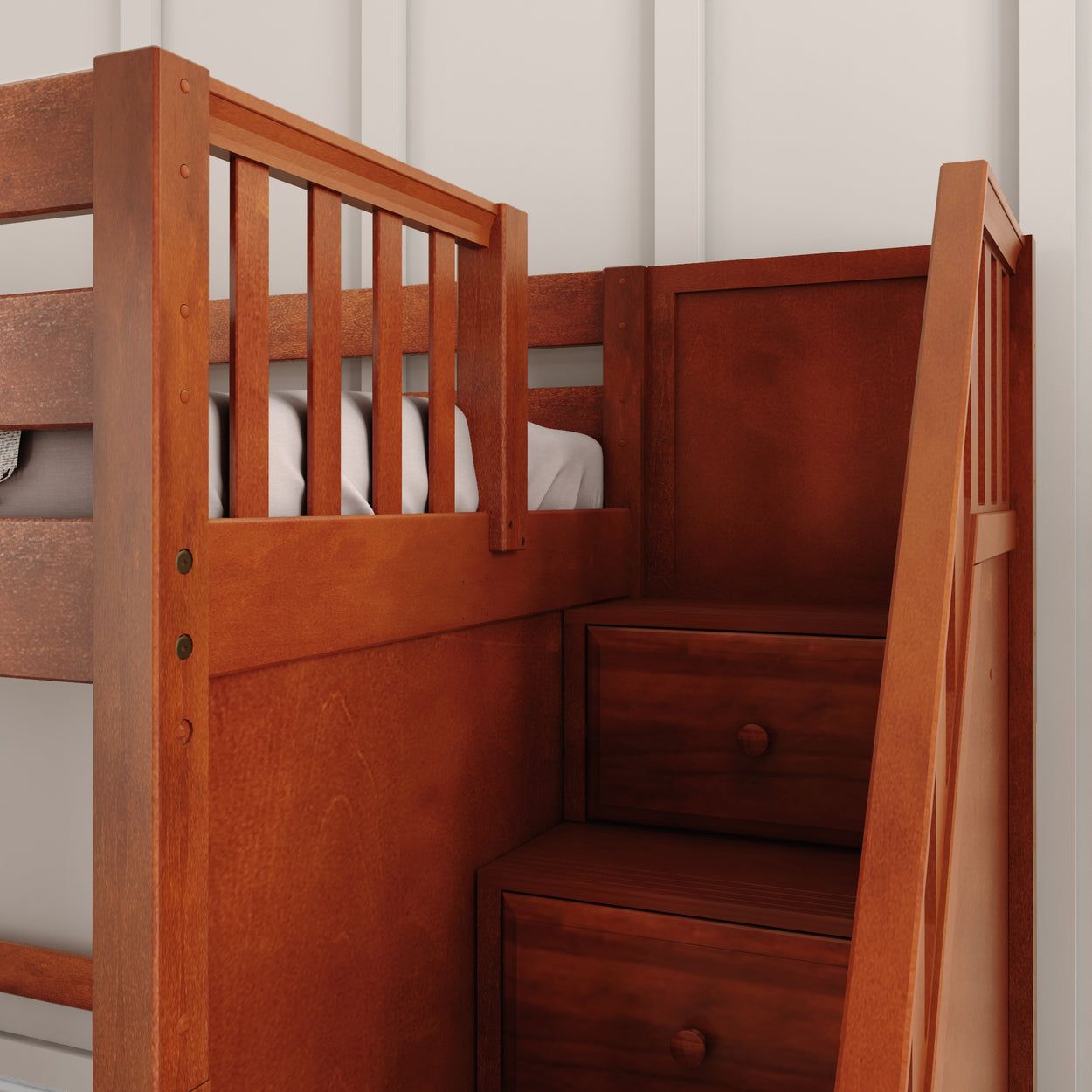Wooden bunk bed with built-in storage stairs and railings for safety.