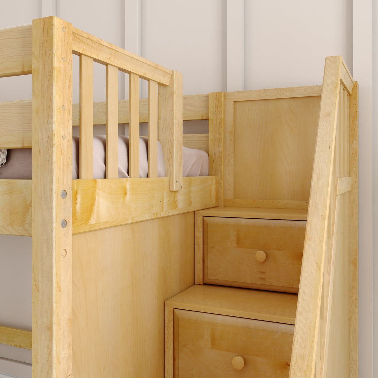 Wooden bunk bed with integrated storage drawers and staircase design.