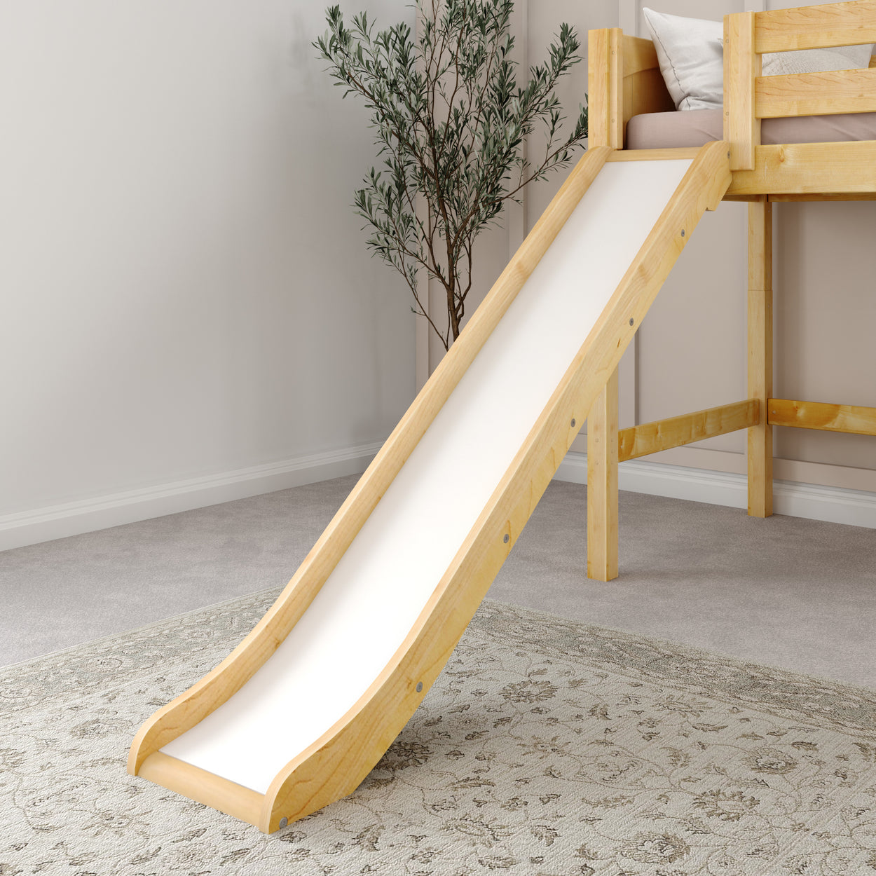 Wooden loft bed with slide and decorative indoor plant in cozy bedroom setting.