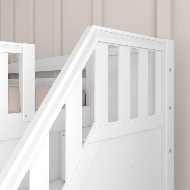 Close-up of white wooden crib safety rail and angled baby bed railing detail against a beige paneled nursery wall