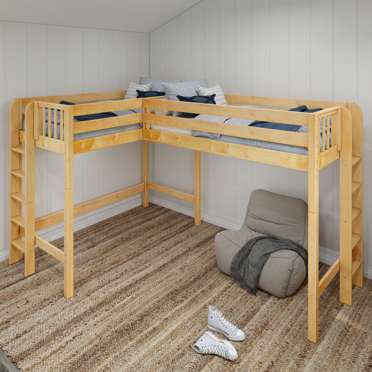 Loft bed with wooden frame and ladder in modern bedroom with bean bag chair and sneakers on rug.