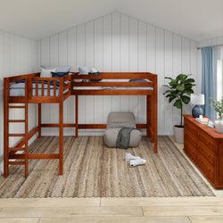 Loft bed in a cozy bedroom with wood flooring and furniture, featuring a soft armchair and decorative plants for a comfortable and stylish space.