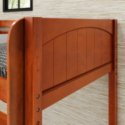 Wooden bunk bed with natural finish and decorative paneling against beige wallpaper background.